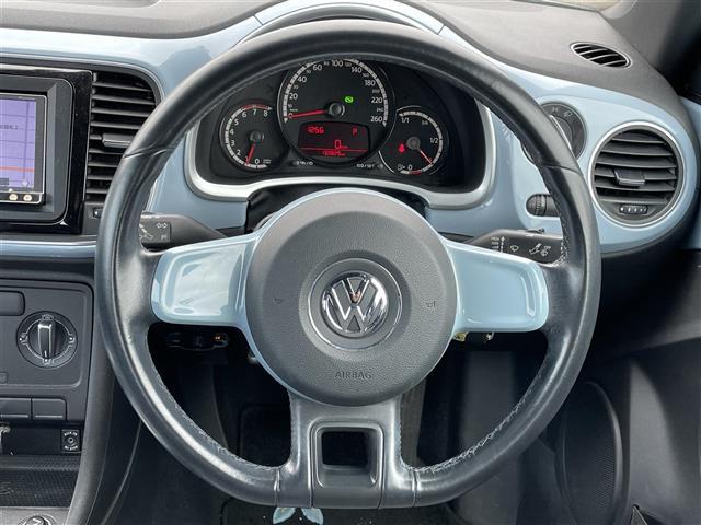 ザ・ビートル デザイン　ワンオーナー　社外メモリーナビ　横滑り防止装置　クルーズコントロール　ＥＴＣ　革巻きステアリング　ＭＴモード付ＡＴ　リモコンキー　ハロゲンヘッドライト　フォグランプ　ヘッドライトレベライザー（8枚目）