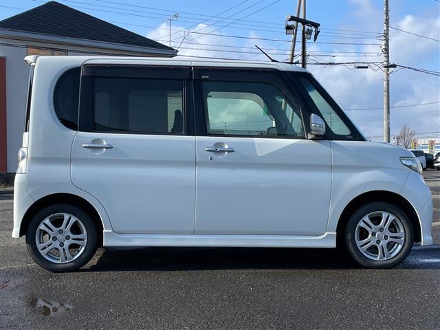 タント カスタムＬ　ワンオーナー　純正ＳＤナビ　ＥＴＣ　アイドリングストップ　片側スライドドア　スマートキー　キセノンヘッドライト　フォグランプ　電動格納ミラー　ウィンカーミラー　純正フロアマット　ドアバイザー（4枚目）