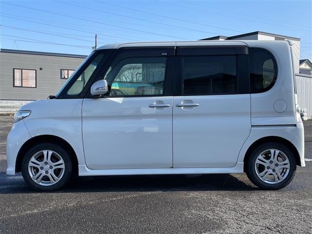 タント カスタムＬ　ワンオーナー　純正ＳＤナビ　ＥＴＣ　アイドリングストップ　片側スライドドア　スマートキー　キセノンヘッドライト　フォグランプ　電動格納ミラー　ウィンカーミラー　純正フロアマット　ドアバイザー（5枚目）