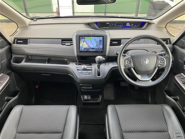 フリード Ｇ・ホンダセンシング　ワンオーナー／社外ナビ／フルセグＴＶ／純正エンジンスターター／ドライブレコーダー／バックカメラ／寒冷地仕様／両側パワースライドドア／シートヒーター／レーダークルーズコントロール／レーンキープアシスト（3枚目）