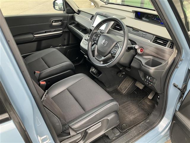 フリード Ｇ・ホンダセンシング　ワンオーナー／社外ナビ／フルセグＴＶ／純正エンジンスターター／ドライブレコーダー／バックカメラ／寒冷地仕様／両側パワースライドドア／シートヒーター／レーダークルーズコントロール／レーンキープアシスト（18枚目）