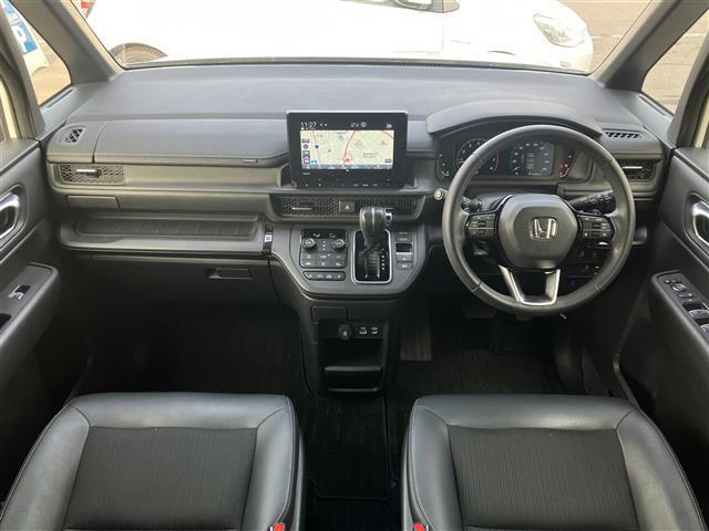 ステップワゴン スパーダ 純正ナビ/フルセグTV/寒冷地仕様/全周囲カメラ/シートヒーター/パワーバックドア/オットマン/両側パワースライドドア/衝突被害軽減ブレーキ/レーダクルーズコントロール/レーンキープアシスト/ETC(3枚目)