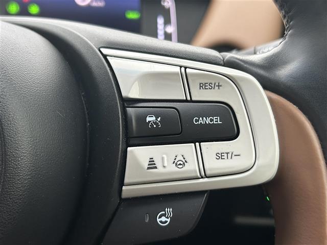 フィット ｅ：ＨＥＶリュクス　純正ナビ／フルセグＴＶ／ドライブレコーダー／バックカメラ／寒冷地仕様／シートヒーター／ハンドルウォーマー／コーナーセンサー／レーダークルーズコントロール／レーンキープアシスト／オートハイビーム／ＥＴＣ（14枚目）