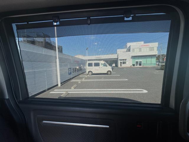 ステップワゴンスパーダ スパーダホンダセンシング　盗難防止　助手席エアバッグ　フロントカメラ　Ｗパワスラ　記録簿有　地デジ　サイドエアバッグ　ベンチシート　ＬＥＤライト　横滑り防止システム　オートエアコン　リアカメラ（23枚目）