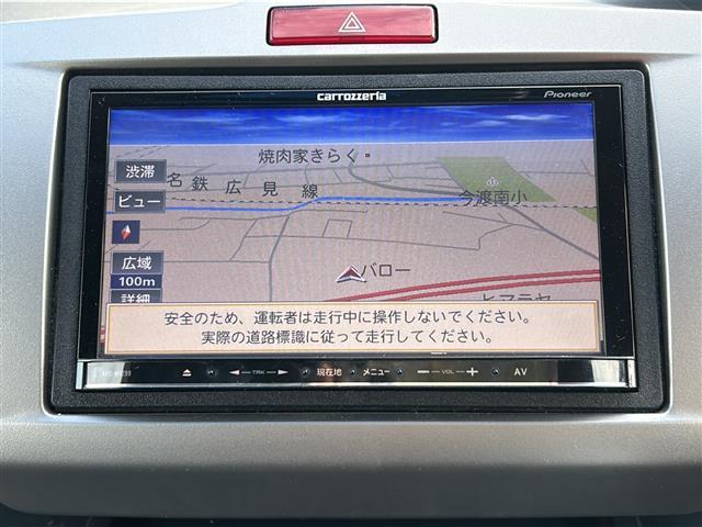 フリード Ｇ　ジャストセレクション　社外７インチナビ／両側パワースライドドア／ワンセグＴＶ／ウィンカーミラー／社外アルミホイール／キセノンヘッドライト／純正フロアマット／ウォークスルー／３列シート／Ｂｌｕｅｔｏｏｔｈ接続／スマートキー／（6枚目）