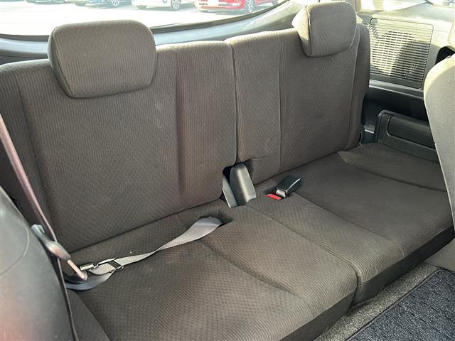 フリード Ｇ　ジャストセレクション　社外７インチナビ／両側パワースライドドア／ワンセグＴＶ／ウィンカーミラー／社外アルミホイール／キセノンヘッドライト／純正フロアマット／ウォークスルー／３列シート／Ｂｌｕｅｔｏｏｔｈ接続／スマートキー／（18枚目）