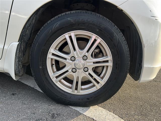 フリード Ｇ　ジャストセレクション　社外７インチナビ／両側パワースライドドア／ワンセグＴＶ／ウィンカーミラー／社外アルミホイール／キセノンヘッドライト／純正フロアマット／ウォークスルー／３列シート／Ｂｌｕｅｔｏｏｔｈ接続／スマートキー／（27枚目）