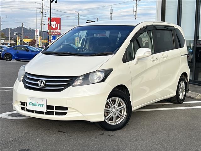 フリード Ｇ　ジャストセレクション　社外７インチナビ／両側パワースライドドア／ワンセグＴＶ／ウィンカーミラー／社外アルミホイール／キセノンヘッドライト／純正フロアマット／ウォークスルー／３列シート／Ｂｌｕｅｔｏｏｔｈ接続／スマートキー／（31枚目）