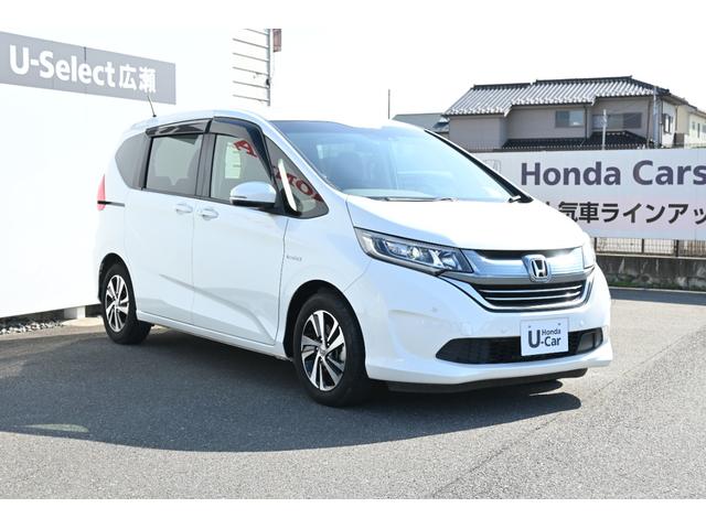 フリードハイブリッド ハイブリッド・EX ホンダセンシング 純正9INナビ Rカメラ 2.0ETC Fドラレコ 障害物センサー シートヒーター アルミホイール LEDライト 両側Pスライドドア 1オナ 地デジフルセグTV シ-トヒ-タ-(6枚目)