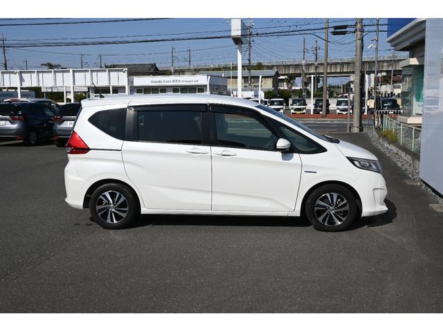 フリードハイブリッド ハイブリッド・EX ホンダセンシング 純正9INナビ Rカメラ 2.0ETC Fドラレコ 障害物センサー シートヒーター アルミホイール LEDライト 両側Pスライドドア 1オナ 地デジフルセグTV シ-トヒ-タ-(9枚目)
