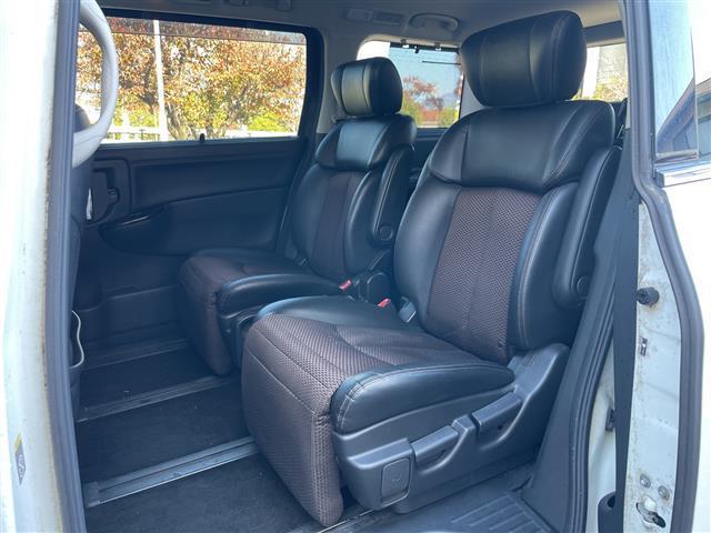 エルグランド 250ハイウェイスター 社外ナビ 社外フリップダウンモニター 両側パワスラ 半革シート 革巻きステアリング オートライト ウィンカーミラー 木目調パネル ETC 純正18インチAW スマートキー スペアキー 保証書 取説(27枚目)