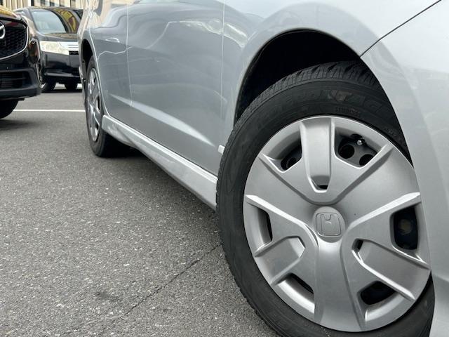 フィットシャトルハイブリッド ハイブリッド・スマートセレクション　ファインライン　ＡＭ／ＦＭ・ＣＤ／ＤＶＤ・アイドリングストップ横滑り防止機能シートヒーター（12枚目）