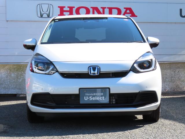フィット e:HEVホーム レンタアップカー 9インチプレミアムインターナビ リアカメラ ETC2.0 HondaCONNNECT フロントドライブレコーダー パーキングセンサー HondaSENSING 禁煙車 スマートキー(5枚目)