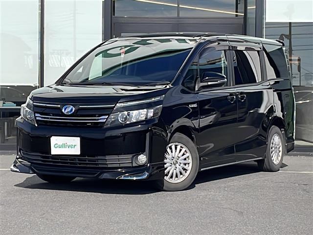 ヴォクシー ハイブリッドＶ　純正ＳＤナビ（Ｂｌｕｅｔｏｏｔｈ，バックカメラ，フルセグＴＶ）　ＬＥＤオートライト　ＵＳＢ入力端子　スマートキー　ＥＴＣ　冷房ＷＡＣ　純正フロアマット　シートヒーター　両側パワースライドドア（34枚目）