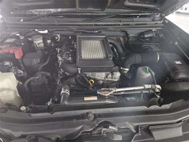 ジムニー ランドベンチャー IC付ターボ 禁煙車 社外LEDヘッドランプ 革巻きステアリング ステアリングスイッチ 合皮シート 前席シートヒーター 純正16インチアルミホイール リモコンキー(5枚目)