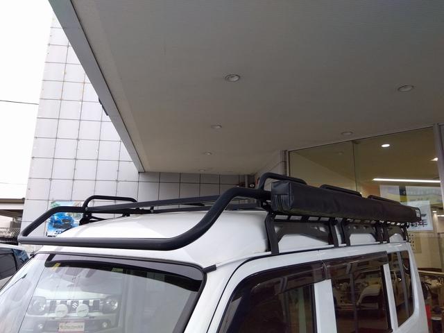 ＮＶ１００クリッパーバン ＤＸ　ＧＬパッケージ　４ＷＤ☆ワンオーナー☆キャンピング仕様☆ＨＡＲＤ　ＣＡＲＧＯルームテント☆サイドオーニング☆ルーフラック☆リアラダー☆ＮＡＮＫＡＮＧ　ＭＴタイヤ☆ＶＥＮＥＳアルミ☆キーレス☆パーキングセンサー☆（16枚目）