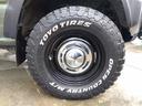 ☆ワンオーナー☆4WD☆リフトアップサス☆DAMDリトルDフェイス☆DEAN16インチAW☆オープンカントリーM/Tタイヤ☆アピオ製TOTSUGEKIマフラー☆NARDIウッドステア☆ルーフライトバー