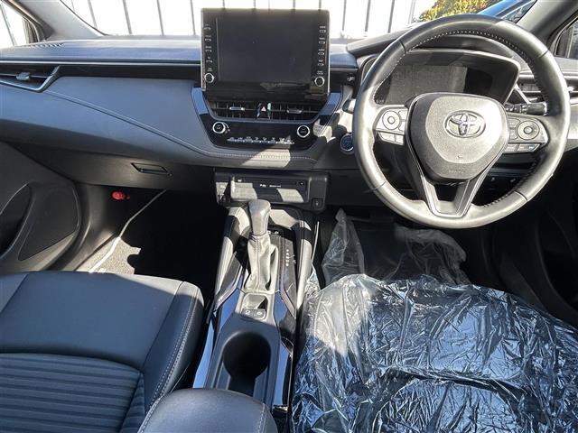 カローラツーリング ハイブリッド　ダブルバイビー　純正ナビ　バックカメラ　アダプティクブクルーズコントロール　レーンアシスト　クリアランスソナー　横滑り防止装置　シートヒーター　ＢＳＭ　ＨＵＤ　オートホールド　ステアリングヒータ　ドラレコ　ＥＴＣ（6枚目）