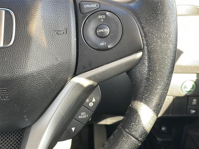 フィットハイブリッド Lパッケージ 純正ナビ バックカメラ ハーフレザーシート ETC 社外15インチアルミ ホイール付き冬タイヤ積込 クルーズコントロール 社外マフラー マフラー積込☆取説☆スぺアキ―(12枚目)