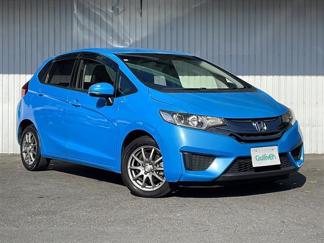 フィットハイブリッド Lパッケージ 純正ナビ バックカメラ ハーフレザーシート ETC 社外15インチアルミ ホイール付き冬タイヤ積込 クルーズコントロール 社外マフラー マフラー積込☆取説☆スぺアキ―(36枚目)