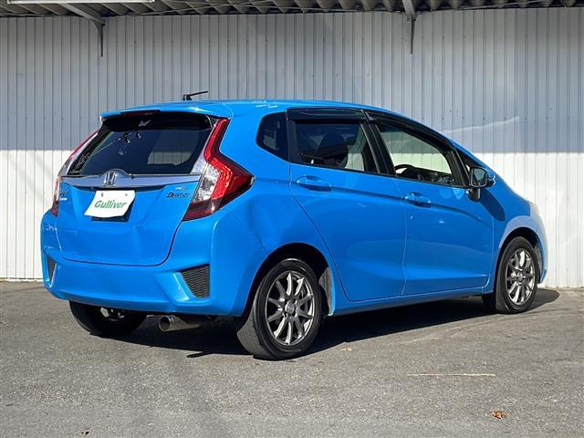 フィットハイブリッド Lパッケージ 純正ナビ バックカメラ ハーフレザーシート ETC 社外15インチアルミ ホイール付き冬タイヤ積込 クルーズコントロール 社外マフラー マフラー積込☆取説☆スぺアキ―(40枚目)