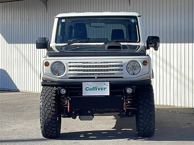 ジムニー XL 純正8型ナビフルセグTV 社外16インチアルミ BFグッドリッチM/T リフトアップ ラテラルロッド 社外ボンネット 社外マフラー 社外前後バンパー 社外グリル 社外テール 社外オーバーフェンダー(21枚目)