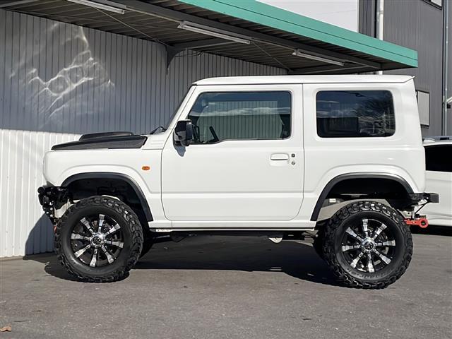 ジムニー XL 純正8型ナビフルセグTV 社外16インチアルミ BFグッドリッチM/T リフトアップ ラテラルロッド 社外ボンネット 社外マフラー 社外前後バンパー 社外グリル 社外テール 社外オーバーフェンダー(40枚目)