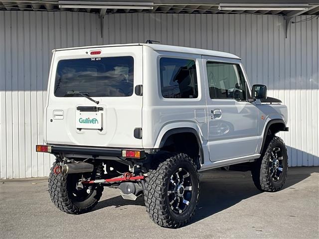 ジムニー XL 純正8型ナビフルセグTV 社外16インチアルミ BFグッドリッチM/T リフトアップ ラテラルロッド 社外ボンネット 社外マフラー 社外前後バンパー 社外グリル 社外テール 社外オーバーフェンダー(41枚目)