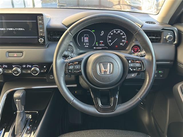 ヴェゼル e:HEV Z ホンダセンシング/寒冷地仕様/ドラレコ/純正ディスプレイオーディオ/BSM/バックカメラ/電動リアゲート/LEDオートライト/ハーフレザーシート/ステアリングヒーター/ステアリングスイッチ/純正AW(3枚目)