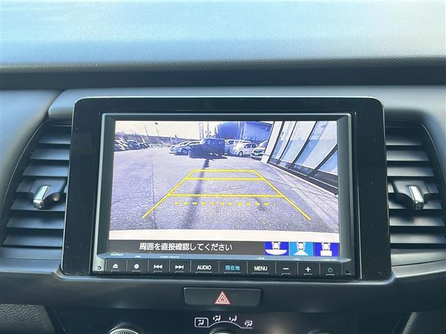 フィット ホーム　禁煙車／ホンダセンシング／純正ナビ／寒冷地仕様／コーナーセンサー／バックカメラ☆ＬＥＤオートライト／オートマチックハイビーム／ハーフレザーシート／前後ドライブレコーダー／ステアリングスイッチ／ＥＴＣ（5枚目）