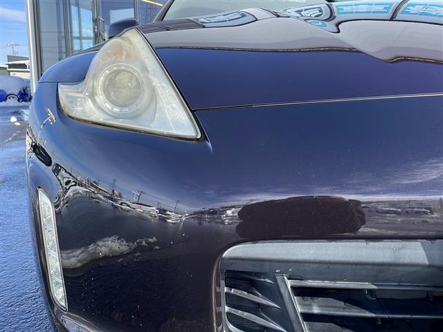 フェアレディＺ ロードスターバージョンＴ　禁煙車／電動オープン／ＢＯＳＥ／純正ナビ／Ｂカメ／ハーフレザー／パワーシート／シートヒーター／エアシート／ＥＴＣ／純正１８インチＡＷ／ＨＫＳマフラー／ＬＥＤヘッドライト／純正フロアマット／スマートキー（21枚目）