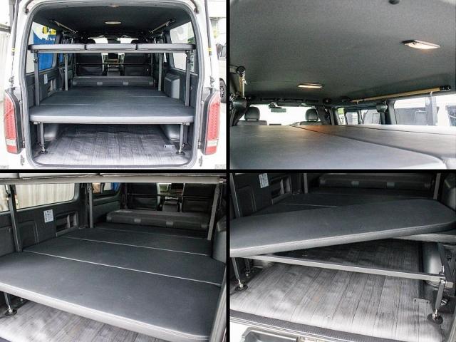 ハイエースバン スーパーGL ダークプライムII ロングボディ 二段ベッド パナソニックナビ パイオニアフリップダウンモニター 社外デジタルインナーミラー TRD オフロードバンパー マッドフラップ ETC アルミホイール 強化スタビライザー サテライトスピーカー(11枚目)