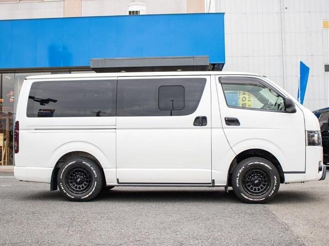 ハイエースバン スーパーGL ダークプライムII ロングボディ 二段ベッド パナソニックナビ パイオニアフリップダウンモニター 社外デジタルインナーミラー TRD オフロードバンパー マッドフラップ ETC アルミホイール 強化スタビライザー サテライトスピーカー(19枚目)