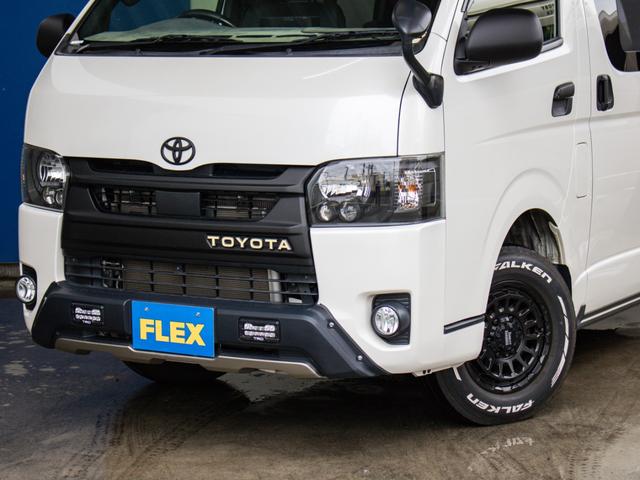 ハイエースバン スーパーGL ダークプライムII ロングボディ 二段ベッド パナソニックナビ パイオニアフリップダウンモニター 社外デジタルインナーミラー TRD オフロードバンパー マッドフラップ ETC アルミホイール 強化スタビライザー サテライトスピーカー(24枚目)