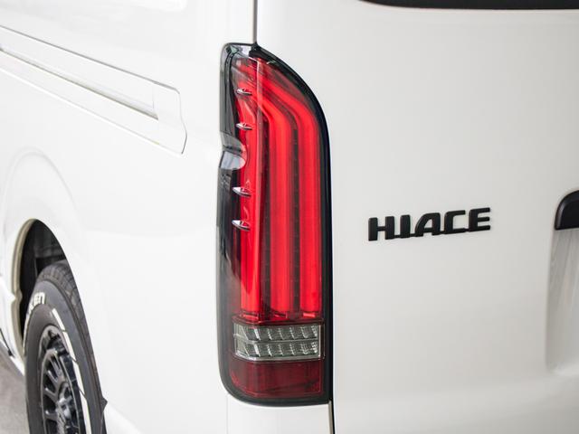 ハイエースバン スーパーGL ダークプライムII ロングボディ 二段ベッド パナソニックナビ パイオニアフリップダウンモニター 社外デジタルインナーミラー TRD オフロードバンパー マッドフラップ ETC アルミホイール 強化スタビライザー サテライトスピーカー(28枚目)