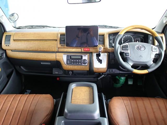 ハイエースバン ロングスーパーGL 丸目 BIG-Xナビ ETC2.0 パノラミックビューモニター エアバック アースカラー ベージュ フロントスポイラー アルミホイール LEDテール シートカバー全席 ベッドキット オーバーフェンダー(2枚目)