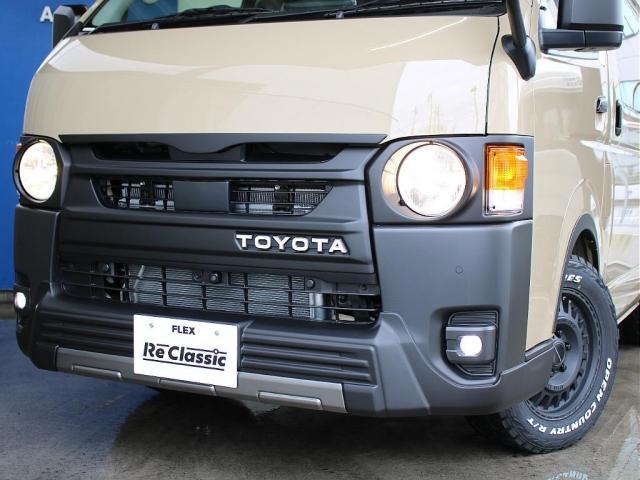 ハイエースバン ロングスーパーGL 丸目 BIG-Xナビ ETC2.0 パノラミックビューモニター エアバック アースカラー ベージュ フロントスポイラー アルミホイール LEDテール シートカバー全席 ベッドキット オーバーフェンダー(17枚目)