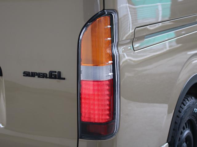 ハイエースバン ロングスーパーGL 丸目 BIG-Xナビ ETC2.0 パノラミックビューモニター エアバック アースカラー ベージュ フロントスポイラー アルミホイール LEDテール シートカバー全席 ベッドキット オーバーフェンダー(26枚目)