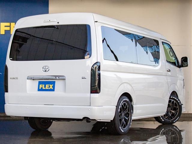 ハイエースワゴン ＧＬ　ＢＩＧ－Ｘナビ　ＥＴＣ２．０　フリップダウン　ルースピ　ローダウン　フロントスポイラー　オバフェン　アヴェスト　ウィンカーミラー　インパネ　シートカバー　エアバック　フローリング　ベッドキット　ＬＥＤ（12枚目）
