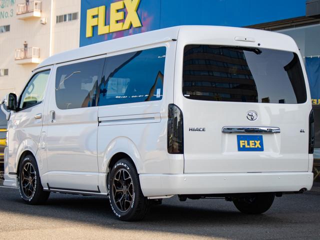 ハイエースワゴン ＧＬ　ＢＩＧ－Ｘナビ　ＥＴＣ２．０　フリップダウン　ルースピ　ローダウン　フロントスポイラー　オバフェン　アヴェスト　ウィンカーミラー　インパネ　シートカバー　エアバック　フローリング　ベッドキット　ＬＥＤ（74枚目）
