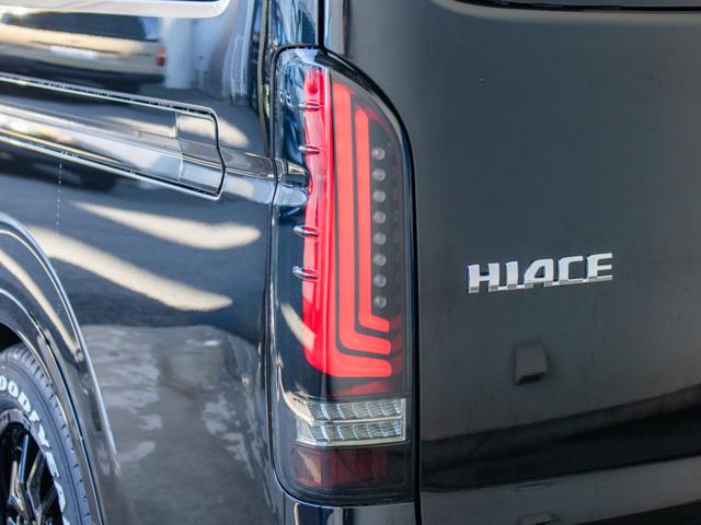 ハイエースワゴン GL ロング BIG-Xパーフェクトフィットナビ ETC2.0付 バックカメラ連動 12.8フリップ ルースピ シートカバー LEDテール アルミホイール ナスカータイヤ オバフェン フロントスポイラー ローダウン(26枚目)