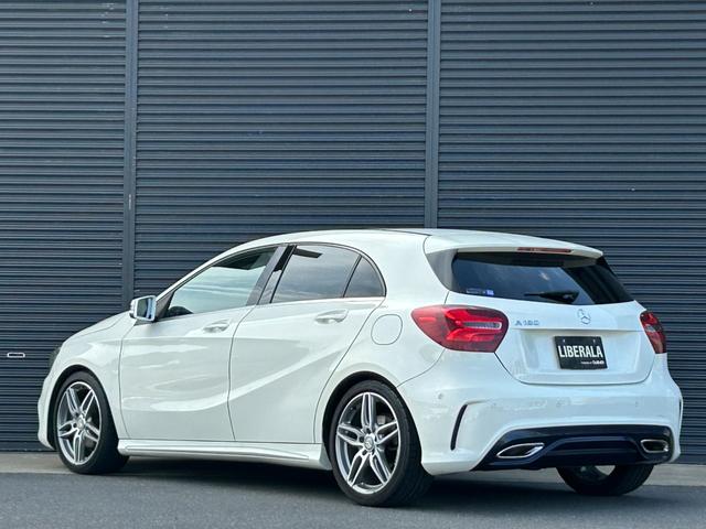 Aクラス A180 スポーツ 後期 AMGレザーエクスクルーシブPKG パノラミックSR harman/kardon 本革 Sヒーター M付PWシートアンビエントライト RSP ACC LKA BSA Bカメラ LED ナビ TV(65枚目)