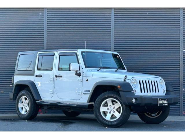 ジープ・ラングラーアンリミテッド スポーツ SDナビ 12セグ BT DVD CD サイド/バックカメラ 白黒レザー調シートカバー LEDヘッドライト クルーズコントロール ETC 純正17インチアルミホイール フロアマット 禁煙車(53枚目)