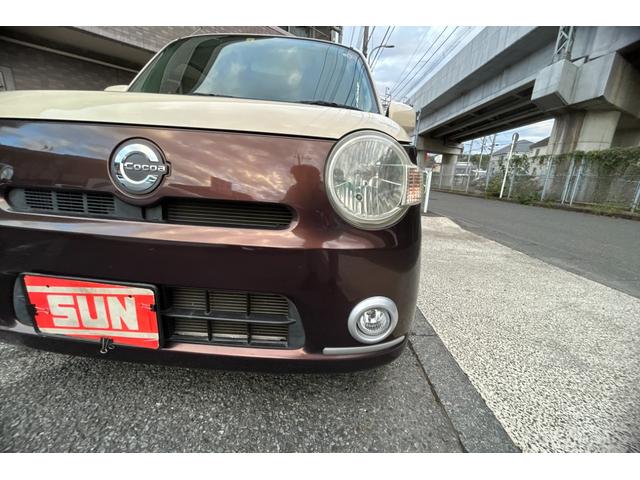 ミラココア ココアX ビートルクリームツートン キーレス ベンチシート エアバック エアコン パワステ パワーウィンドー 盗難防止システム 衝突安全ボディ ABS フォグライト 電動格納ミラー 取扱説明書 記録簿 保証書(55枚目)