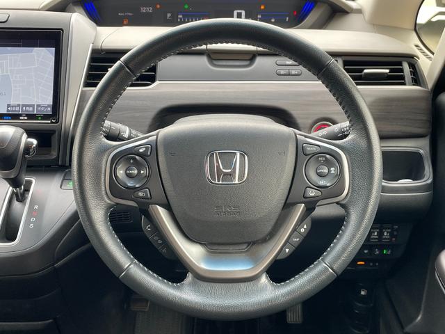 フリード+ G・ホンダセンシング 純正Gathersナビ バックカメラ ETC アダプティブクルーズコントロール スマートキー スペアキー 前後ドライブレコーダー 純正フロアマット ハーフレザーシート シートヒーター 両パワ(26枚目)