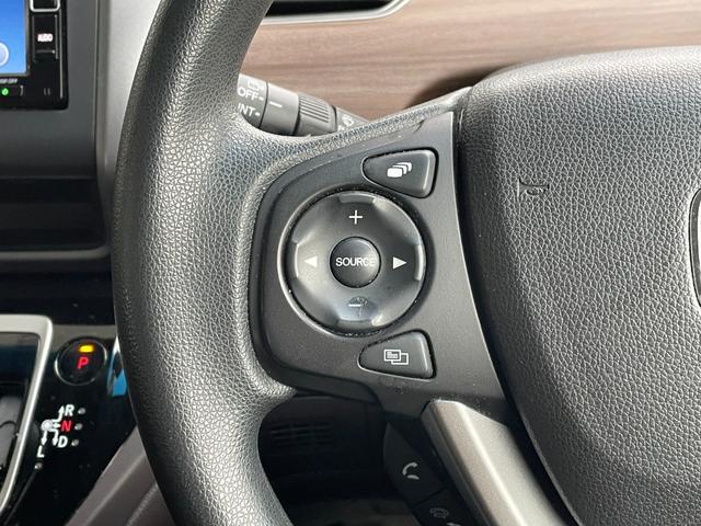 フリード+ハイブリッド ハイブリッドG・ホンダセンシング 純正ナヒ゛ フルセク゛ Bluetooth 両側電動スライドドア 追従型クルコン 前後ドラレコ ETC シートヒーター 純正マット ウインドウシールドデアイサー ECON ステアリングスイッチ(13枚目)