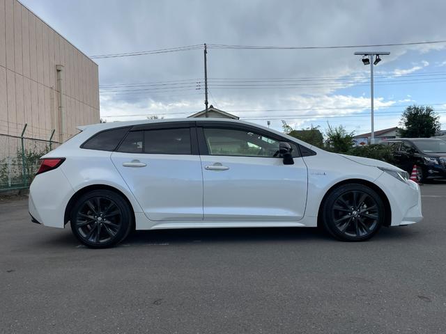 カローラツーリング ハイブリッド　ダブルバイビー　９インチディスプレイオーディオ　バックカメラ　フルセグＴＶ　Ｂｌｕｅｔｏｏｔｈ　ヘッドアップディスプレイ　トヨタセーフティーセンス　　レーントレーシングアシスト　ブラインドスポットモニター　純正マット（60枚目）