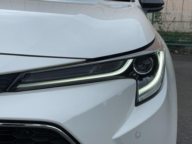 カローラツーリング ハイブリッド　ダブルバイビー　９インチディスプレイオーディオ　バックカメラ　フルセグＴＶ　Ｂｌｕｅｔｏｏｔｈ　ヘッドアップディスプレイ　トヨタセーフティーセンス　　レーントレーシングアシスト　ブラインドスポットモニター　純正マット（76枚目）