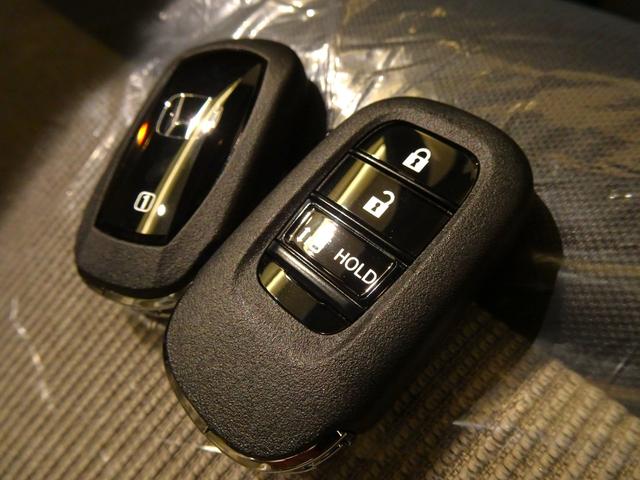N-BOX ベースグレード 届出済未使用車 ホンダセンシング ナビ装着用スペシャルパッケージ クルーズコントロール パーキングセンサー シートヒーター 片側パワースライドドア(7枚目)