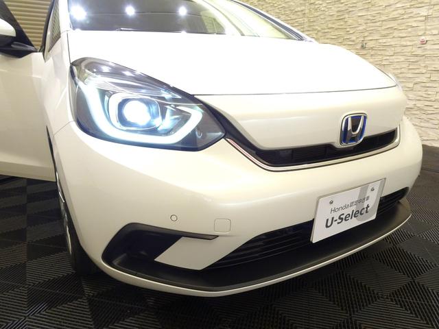 フィット ｅ：ＨＥＶホーム　禁煙　純正９ｉｎｃｈナビＴＶ　ＥＴＣ　ＬＥＤ　リアカメラ　Ｂｌｕｅｔｏｏｔｈ　衝突軽減Ｂ　ＶＳＡ　サイドエアバック　パーキングセンサー　クルーズコントロール　スマートキー　オートＡＣ　ワンオーナー（10枚目）